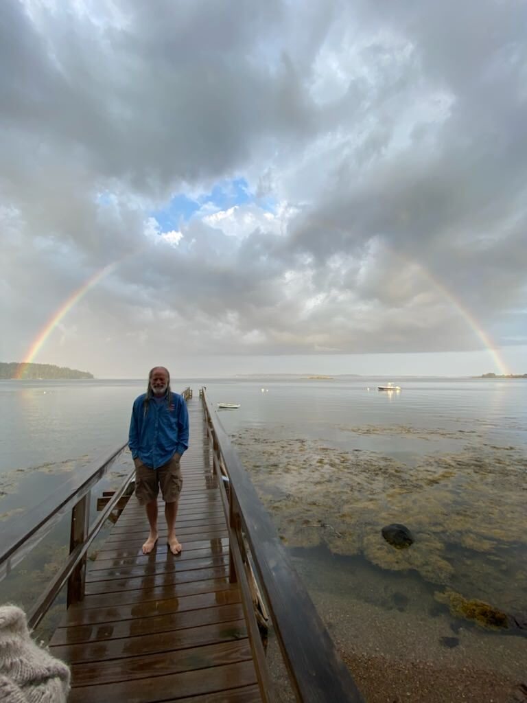 Eric Best on the runway under a rainbow in Cape Rosier, Maine